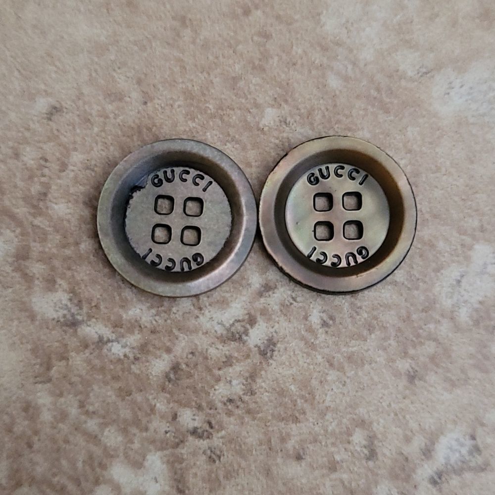 Gucci Set Of 2 Bronze Iridescent Buttons Engraved With 'GUCCI' - Picture 1 of 4